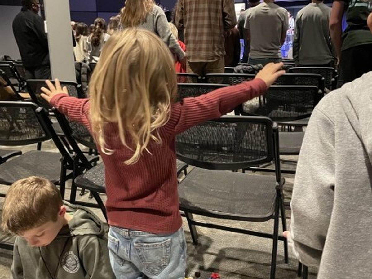 The congregation worshipping together at a 12 Tribes night